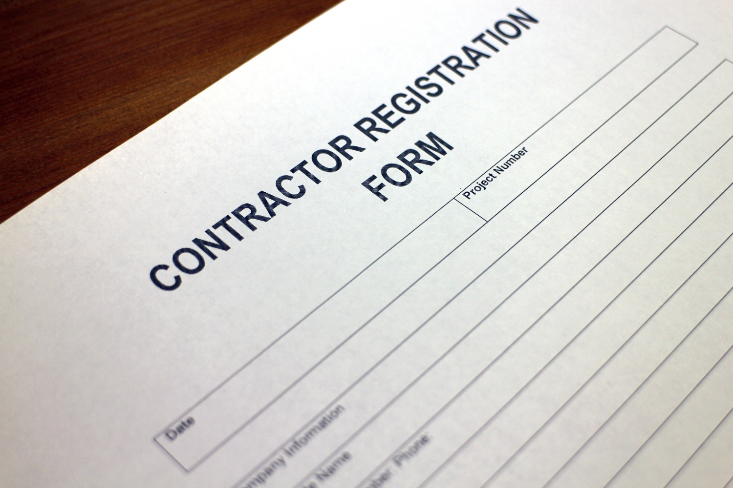 A closeup image of an unfilled contractor registration form